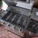 Monument Grills 4 Burner Freestanding Stainless Steel Propane Gas Grill with Clear View Lid Side Burner  and  Infrared Sear Zone