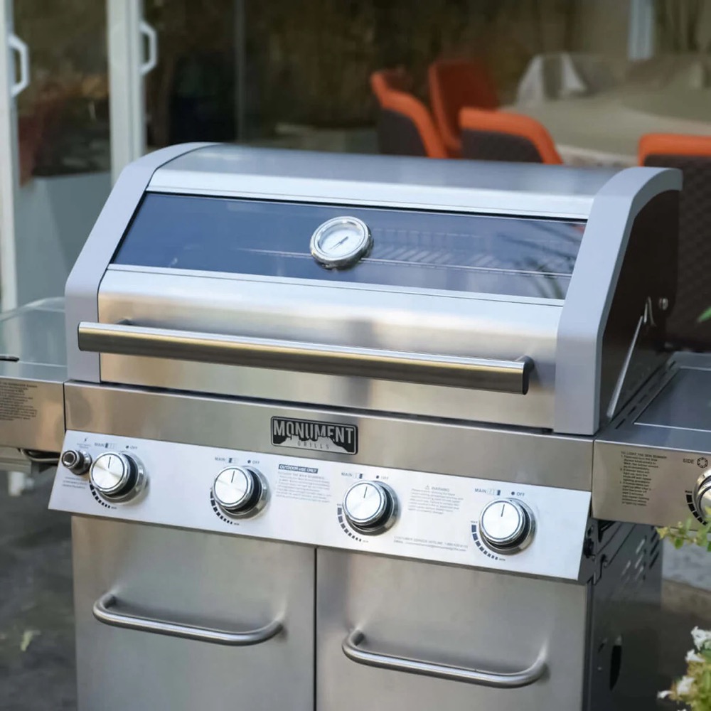 Monument Grills 4 Burner Freestanding Stainless Steel Propane Gas Grill with Clear View Lid Side Burner  and  Infrared Sear Zone