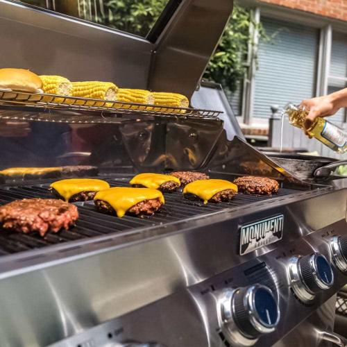 Monument Grills 4 Burner Freestanding Stainless Steel Propane Gas Grill with Clear View Lid Side Burner  and  Infrared Sear Zone