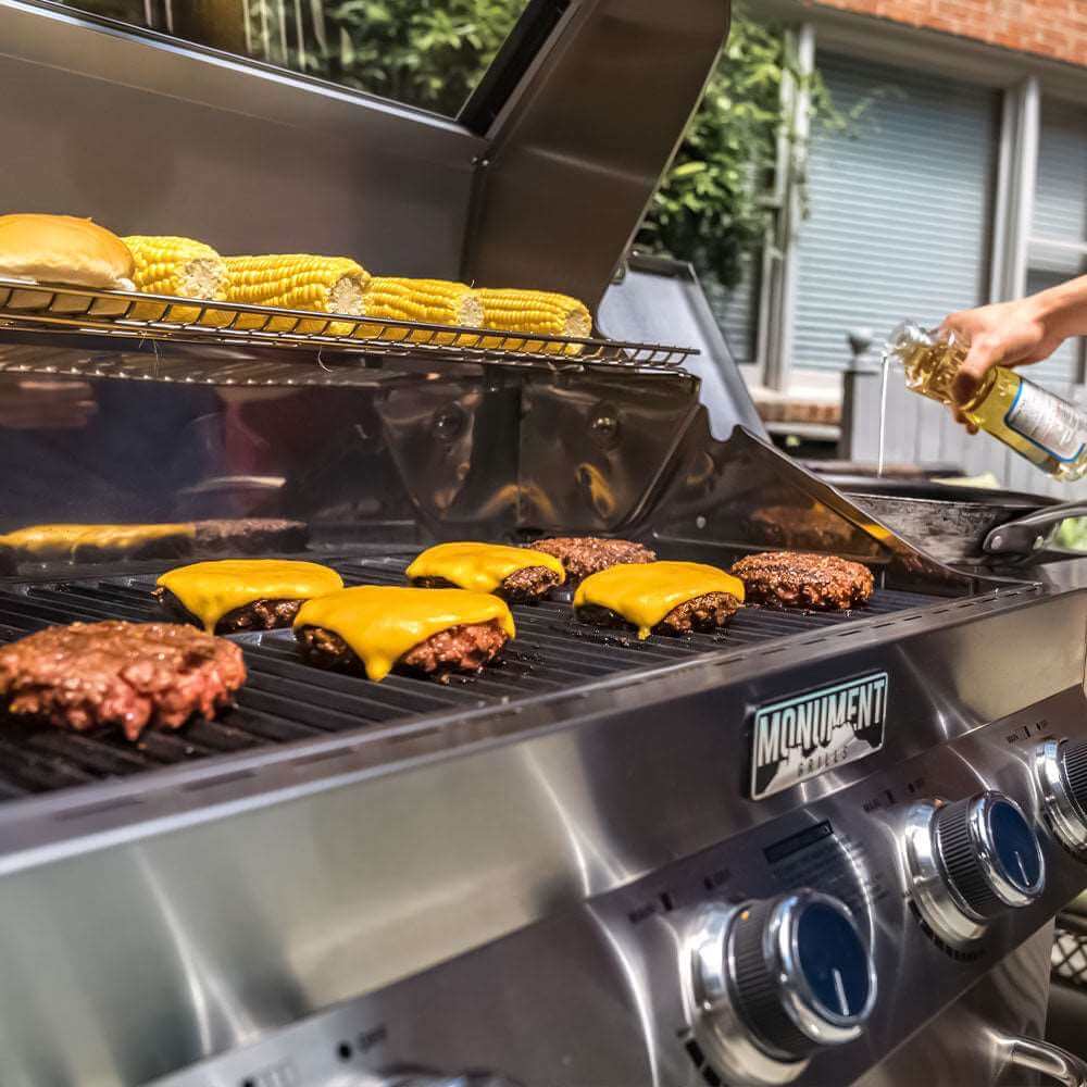 Monument Grills 4 Burner Freestanding Stainless Steel Propane Gas Grill with Clear View Lid Side Burner  and  Infrared Sear Zone