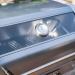 Monument Grills 4 Burner Freestanding Stainless Steel Propane Gas Grill with Clear View Lid Side Burner  and  Infrared Sear Zone