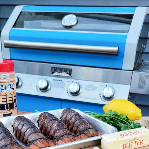 Monument Grills 4 Burner Freestanding Stainless Steel Propane Gas Grill with Clear View Lid Side Burner  and  Infrared Sear Zone   Matte Blue
