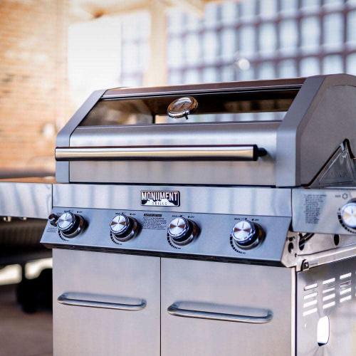 Monument Grills 4 Burner Natural Gas in Stainless Steel with Clear View Lid LED Controls and Side Burner